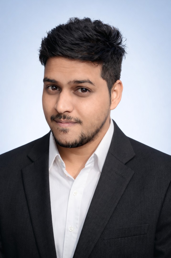 A professional portrait of the founder, Sawan Sharma.